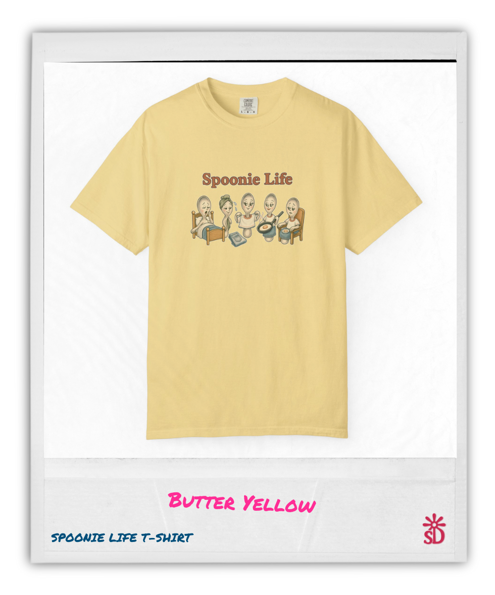 Butter yellow t-shirt with 'Spoonie Life' graphic design on a white background